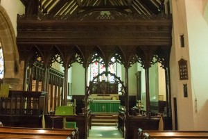 Inside St Mary the Virgin church, Bexley. Showing the quire and nave with the altar in the background.