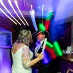 Light trails around a couple as they dance