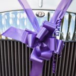 Daimler wedding car's ribbon bedecked front grill