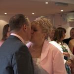 Couple kiss after the marriage ceremony