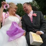 bride and groom unpack a wedding present: discovers pink fur covered handcuffs!